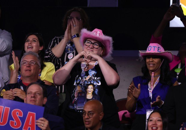 People react as Transportation Secretary Pete Buttigieg speaks at the Democratic National Convention at the United Center in Chicago on Aug. 21, 2024. (Chris Sweda/Chicago Tribune)