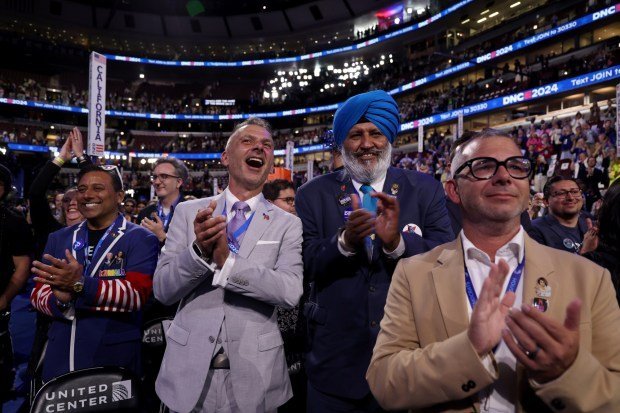 California delegates cheer on Monday, Aug. 19, 2024, during the Democratic National Convention at the United Center. (Brian Cassella/Chicago Tribune)