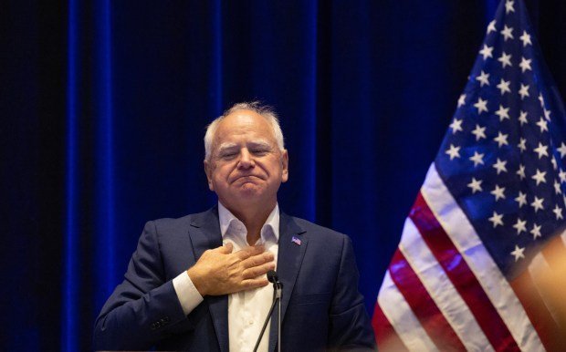 Democratic vice president nominee Minnesota Gov. Tim Walz makes a surprise appearance and speech during the Women's Caucus at the Democratic National Convention at McCormick Place on Aug. 20. 2024, in Chicago. (Stacey Wescott/Chicago Tribune)